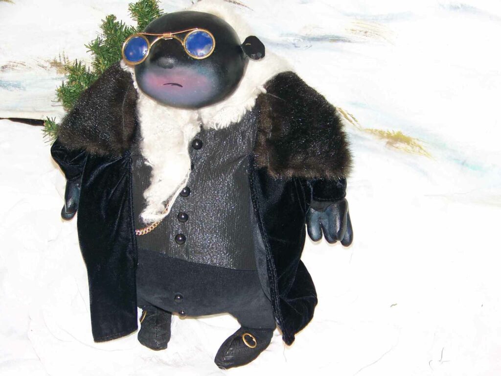 Der kleine Maulwurf, verkleidet als Gangster.