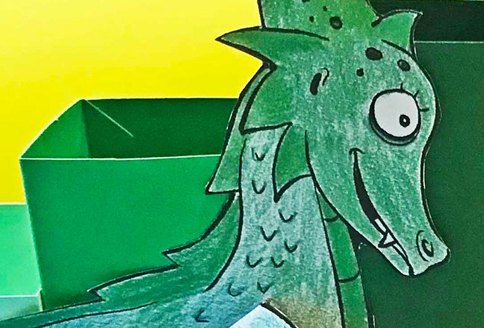 Gebastelter Stiftehalter in Form eines Drachen.