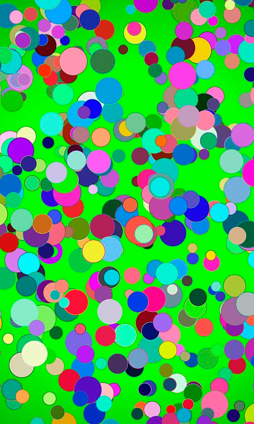 Buntes Konfetti auf grünem Grund.