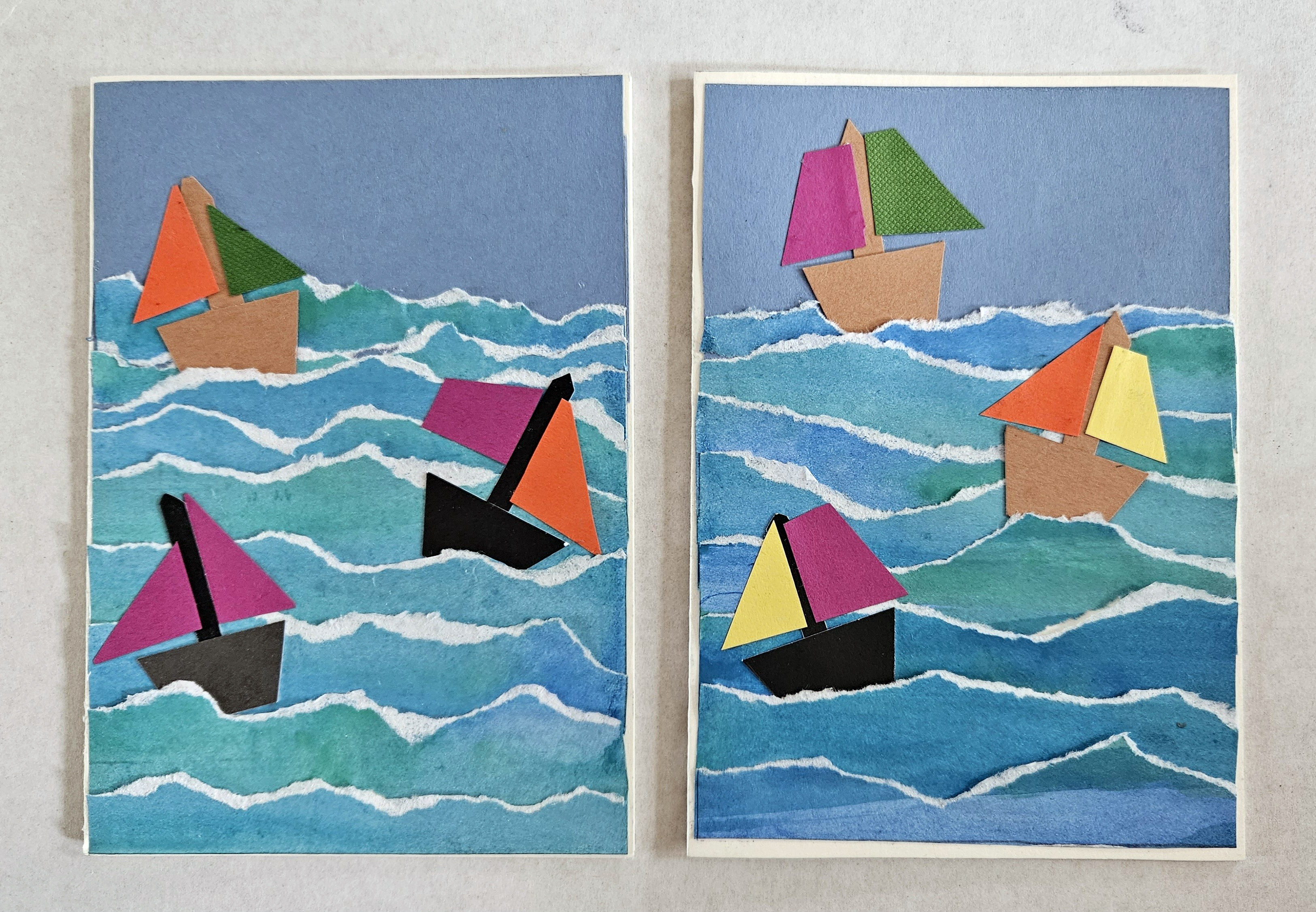 Zwei gebastelte Postkarten mit Schiffen